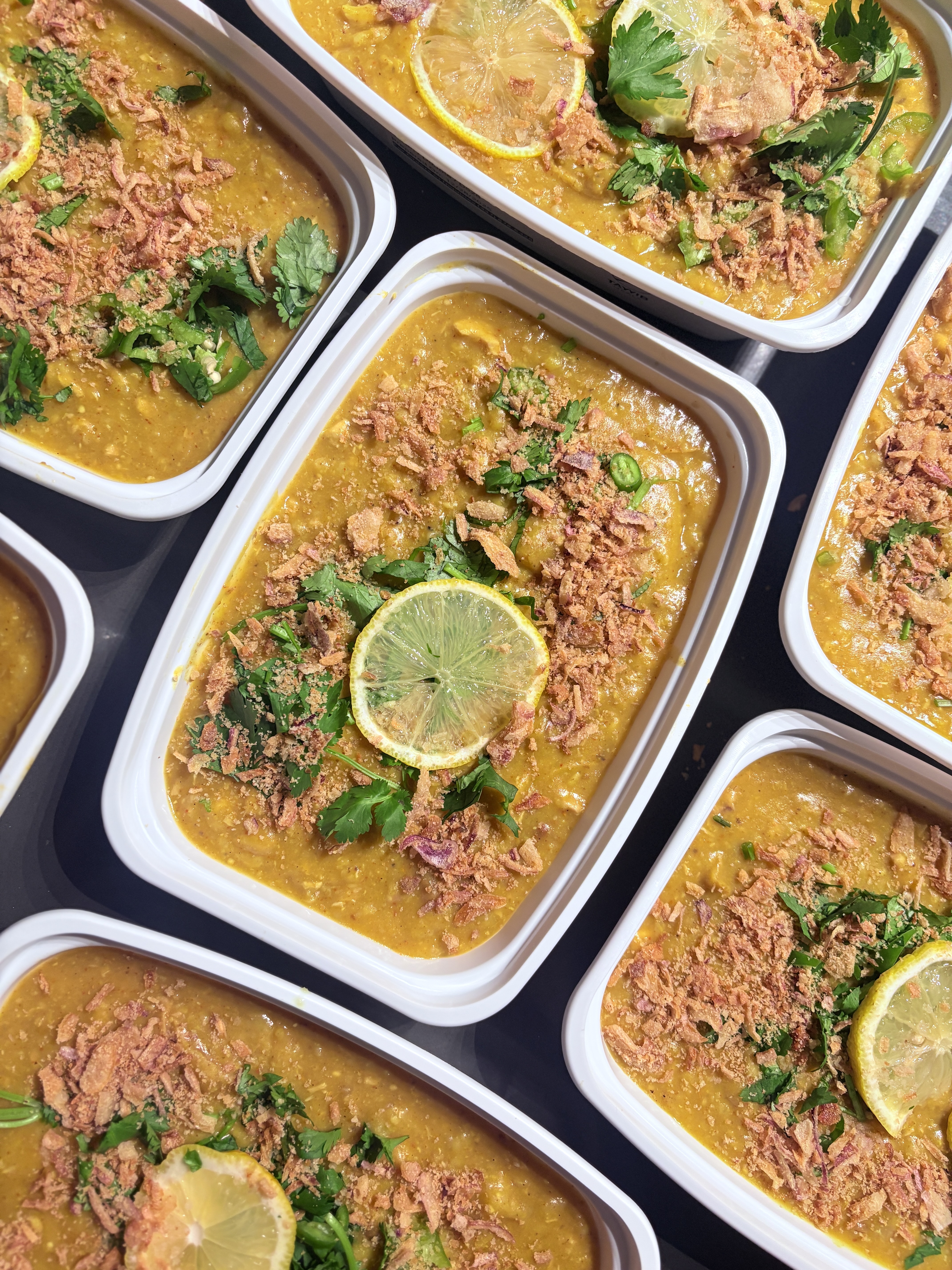 Trays of fresh curry ready for delivery
